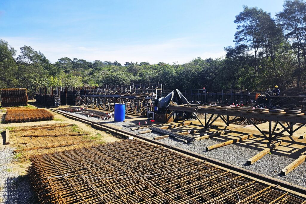 Reinforcing Steel in East London: Your Eastern Cape Supplier 1 Welded mesh sheets laid out beside the bar processing line at the RMS East London yard