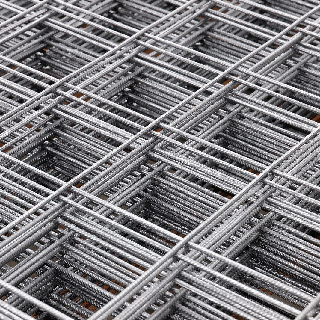 Stacked welded reinforcing mesh sheets in the RMS yard