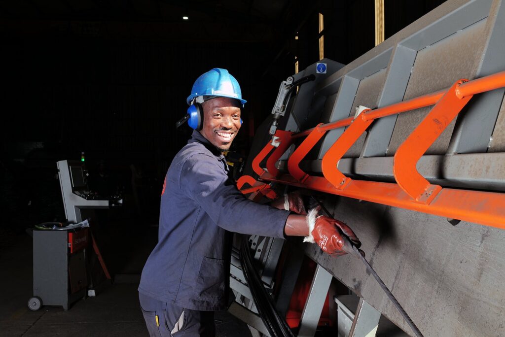 Welded Mesh and Cut and Bend for Coastal Builds in Durban and Richards Bay 5 RMS Durban operator at a cut and bend machine