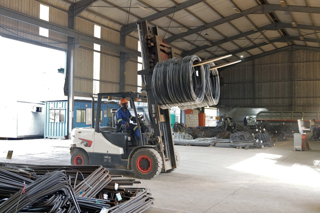 Welded Mesh and Cut and Bend for Coastal Builds in Durban and Richards Bay 11 Forklift moving coils of steel at RMS Durban