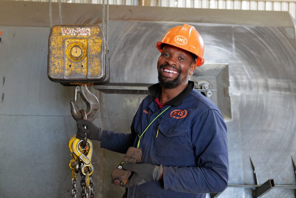 Welded Mesh and Cut and Bend for Coastal Builds in Durban and Richards Bay 12 RMS Durban team member at an overhead hoist in the warehouse