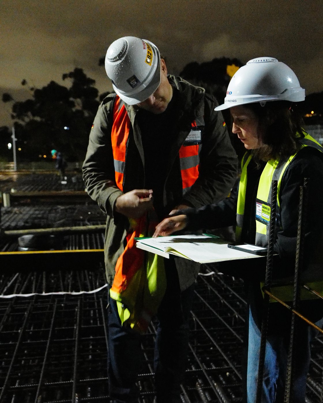 The Granger Building, Cape Town 6 RMS and site staff checking the reinforcement drawings at night before the concrete pour