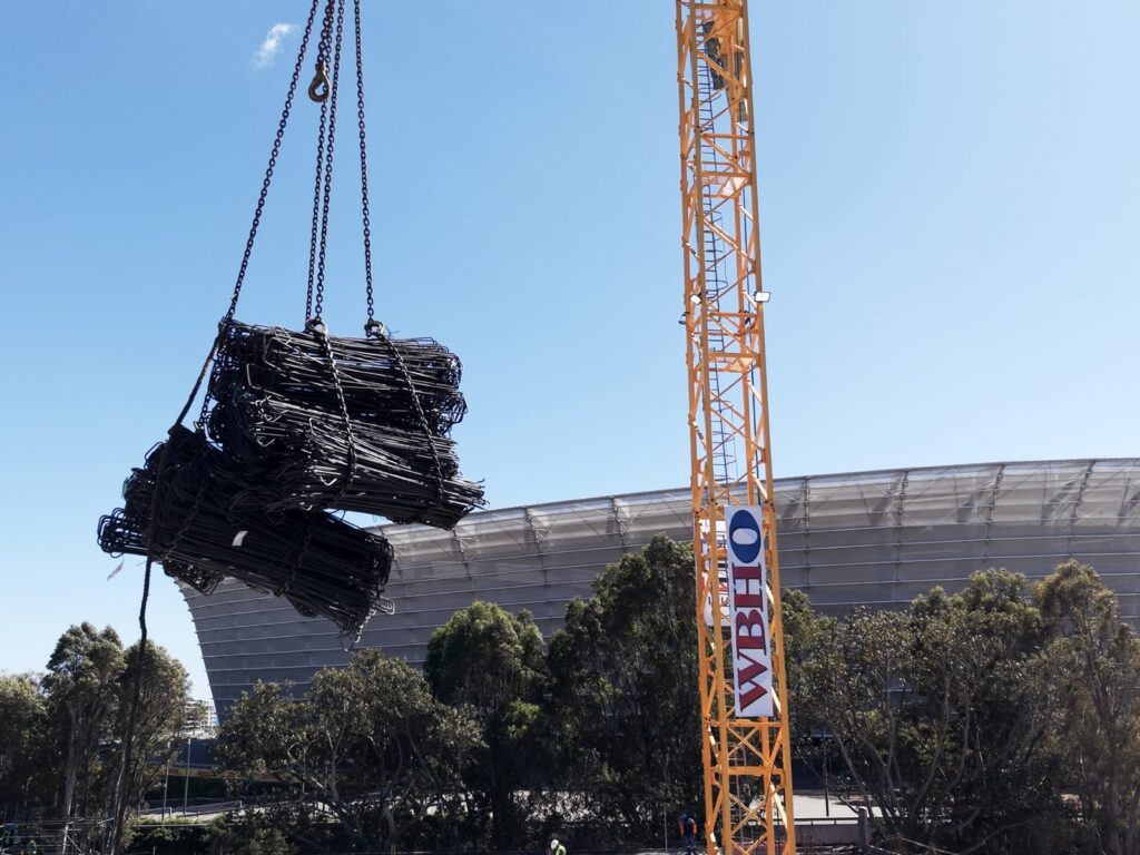 The Granger Building, Cape Town 11 Crane lifting bundles of reinforcing steel onto site beside the stadium