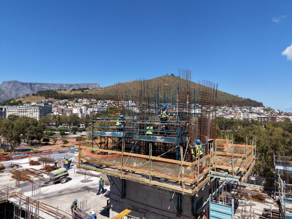 The Granger Building, Cape Town 13 Steel fixers on core wall reinforcement with Signal Hill and Table Mountain behind